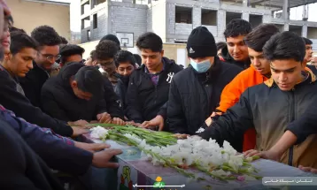 تشییع پیکر شهید گمنام در دبیرستان حاج‌کاظمی اراک